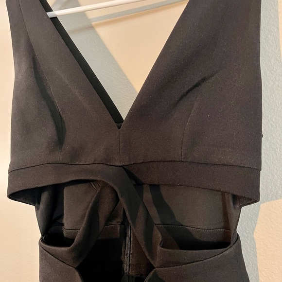 Express black jumpsuit with deep V and cutouts, never worn. - Picture 2 of 3